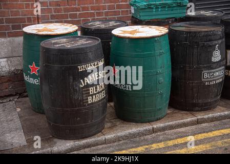 Beer and whiskey kegs outside Bruxelles Bar in Dublin Ireland. Stock Photo