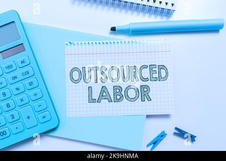 Text caption presenting Outsourced Labor. Concept meaning storage or communication of information in electronic form Stock Photo