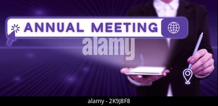 Text sign showing Annual Meeting. Business showcase Graphic artist Software Programmer and Analyst Experts Businessman in suit holding tablet Stock Photo