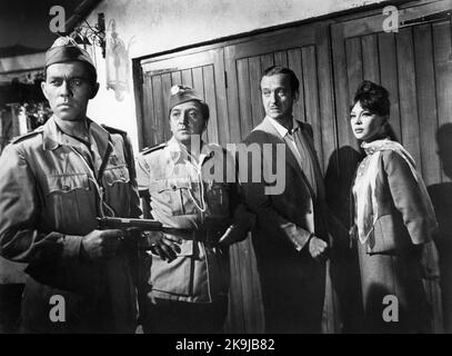 David Niven, Leslie Caron, on-set of the British Film, 'Guns of Darkness', Warner Bros., 1962 Stock Photo