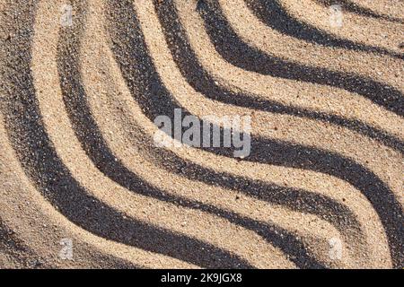 Wavy pattern of natural beach sand background for summer designs. Stock Photo
