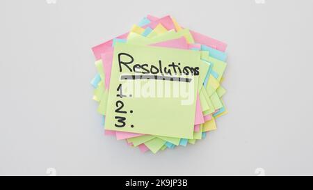 Handwritten resolutions list 1 2 3 on a sticky notes Stock Photo