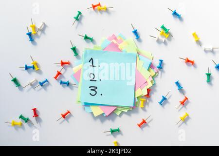 1 2 3 to-do list on a sticky note isolated on white background Stock Photo