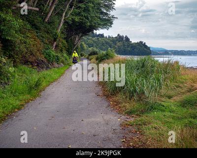 WA22645-00...WASHINGTON - Riding along the Strait of Juan de Fuca, north of Port Angeles on the Olympic Discovery Trail. Stock Photo