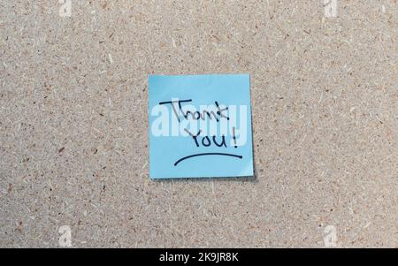 Colorful stack of sticky note isolated on white background with words Thank You. Stock Photo