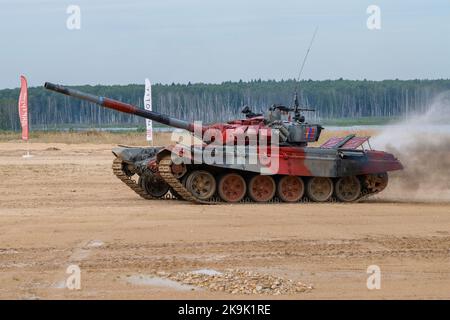 ALABINO, RUSSIA - AUGUST 19, 2022: Tank of mongolian team on the tank biathlon track. International War Games 2022 Stock Photo