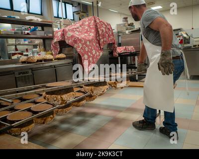 panettone cooking secrets concept hanging up down in the kitchen Stock Photo
