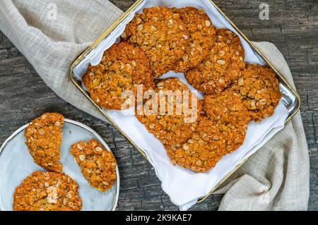 Anzac biscuits - traditional sweet Australian oatmeal and coconut cookies Stock Photo