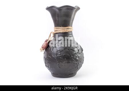 Romanian Black ceramic vase, isolated on white background Stock Photo