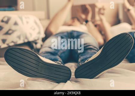 close up. image of a young couple resting on the floor . Stock Photo
