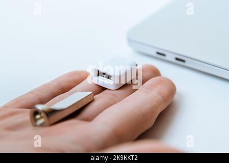 Man uses modern technologies to store memory and digital data Stock Photo