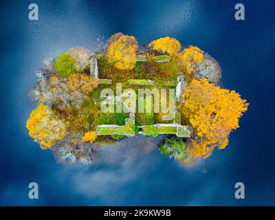 Aviemore, Scotland, UK. 29th October 2022.  Aerial view of spectacular late autumn colours around ruined castle on island on Loch an Eilein in the Rothiemurchus estate in Cairngorms National Park near Aviemore in Scottish Highlands.  Iain Masterton/Alamy Live News Stock Photo