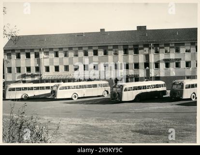 The State Railways, SJ Buses set up in front of building that houses Falu Kuriren, bus station, patisserie and sickness fund. Stock Photo