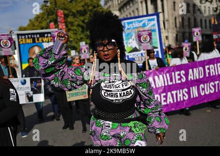 Members of the United Families and Friends Campaigns (UFFC) take part in their 24th Annual Remembrance Procession in central London. The families involved have been bereaved by deaths in police and prison custody, and mental health settings. Picture date: Saturday October 29, 2022. Stock Photo