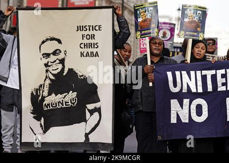 Members of the United Families and Friends Campaigns (UFFC) take part in their 24th Annual Remembrance Procession in central London. The families involved have been bereaved by deaths in police and prison custody, and mental health settings. Picture date: Saturday October 29, 2022. Stock Photo