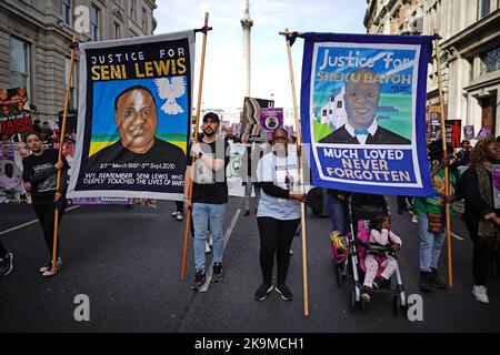 Members of the United Families and Friends Campaigns (UFFC) take part in their 24th Annual Remembrance Procession in central London. The families involved have been bereaved by deaths in police and prison custody, and mental health settings. Picture date: Saturday October 29, 2022. Stock Photo