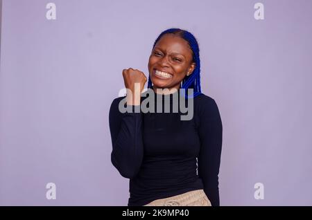 beautiful lady feeling excited isolated over white background Stock Photo