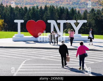Kirkwood, New York, U.S.A - October 15, 2022 - Visitors taking pictures near the 'I Love NY' sign located near the rest stop Stock Photo