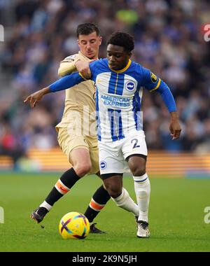 Brighton and Hove Albion's Tariq Lamptey (right) and Chelsea’s Mason Mount battle for the ball during the Premier League match at the Amex Stadium, Brighton. Picture date: Saturday October 29, 2022. Stock Photo