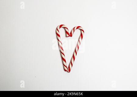 christmas lollipops on a white background. a heart made of lollipops Stock Photo