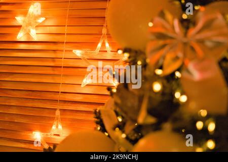 holiday paraphernalia. New Year . toys . lights. Christmas tree . holiday Stock Photo