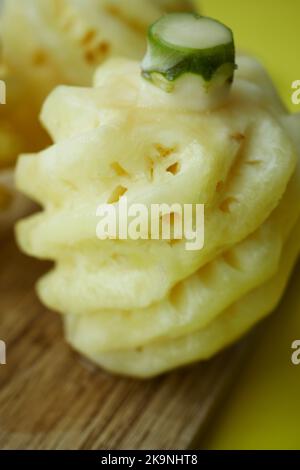slice of pineapple on a wooden board on table  Stock Photo