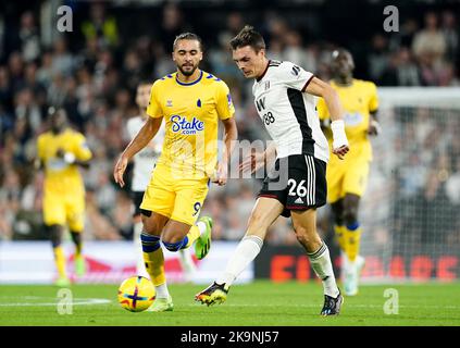 Everton's Dominic Calvert-Lewin (left) and Fulham's Joao Palhinha battle for the ball during the Premier League match at Craven Cottage, London. Picture date: Saturday October 29, 2022. Stock Photo