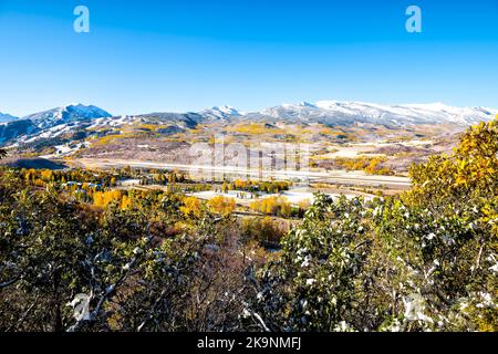 Aspen, Colorado city at Rocky mountains Roaring fork valley high angle view of airport at autumn and snow by Buttermilk ski resort slope mountain Stock Photo