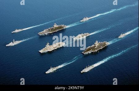 From top row left to right: the Italian Navy ship Frigate MM MAESTRALE (F 570), French Navy Destroyer DE GRASSE (D 612), Nimitz Class Aircraft Carrier USS JOHN C. STENNIS (CVN 74), US Navy (USN) Cruisers USS PORT ROYAL (CG 73), French Navy Aircraft Carrier CHARLES DE GAULLE (R 91), Royal Navy Helicopter Carrier, HMS OCEAN (L 12), French Frigate SURCOUF (F 711), Aircraft Carrier USS JOHN F. KENNEDY (CV 67), Netherlands Navy Frigate Her Majesty’s Netherlands Ship (Harer Majesteits) (HNLMS) VAN AMSTEL (F 831), Italian Navy De La Penne (ex-Animoso) Class Destroyer, MM LUIGI DURAND DE LA PENNE Stock Photo