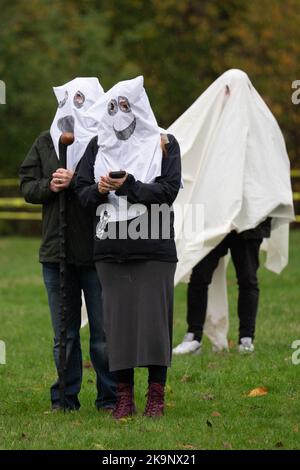 Manchester, UK. 29th Oct, 2022. World record attempt as number of people dressed as ghosts at Platt Fields Park in Manchester. The attempt orgainsed by Paranormal Rescue raised money for the dogs charity Greyhound Gap. The attempt fell short of the world record which organisers blamed on the inclement weather and recent stabbing nearby outside student accomodation at Owens Park student accomodation in Fallowfield. Credit: GaryRobertsphotography/Ģ����ý Live News Stock Photo