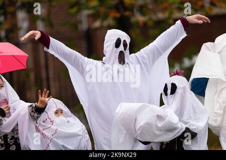 Manchester, UK. 29th Oct, 2022. World record attempt as number of people dressed as ghosts at Platt Fields Park in Manchester. The attempt orgainsed by Paranormal Rescue raised money for the dogs charity Greyhound Gap. The attempt fell short of the world record which organisers blamed on the inclement weather and recent stabbing nearby outside student accomodation at Owens Park student accomodation in Fallowfield. Credit: GaryRobertsphotography/Ģ����ý Live News Stock Photo
