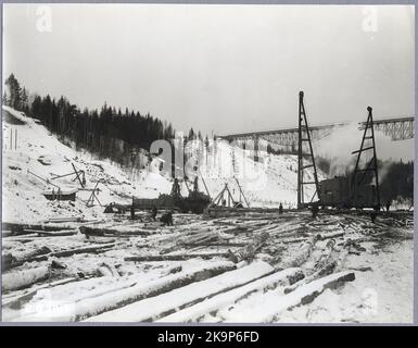 The bridge construction across the Öre River on March 2 from the downstream side with the old bridge in the background. Stock Photo