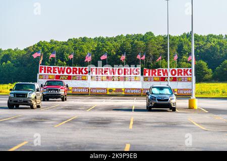 Marion, USA - July 6, 2021: Rural small town countryside village in North Carolina with fireworks store shop sign stall stand kiosk at parking lot Stock Photo