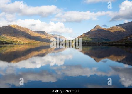 Pap of Glencoe reflected in Loch Leven, Scotland, UK Stock Photo