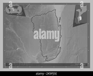 Inhambane, province of Mozambique. Grayscale elevation map with lakes and rivers. Locations and names of major cities of the region. Corner auxiliary Stock Photo