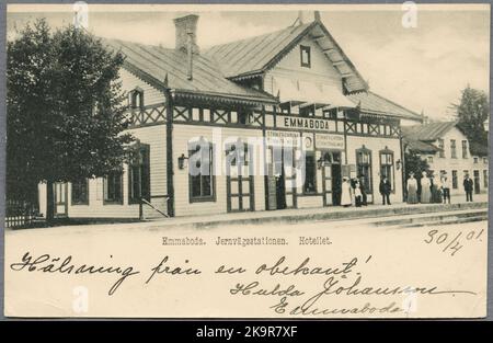 Emmaboda railway station with the railway hotel in the background. Stock Photo