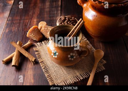 Authentic homemade mexican coffee (cafe de olla) served in traditional