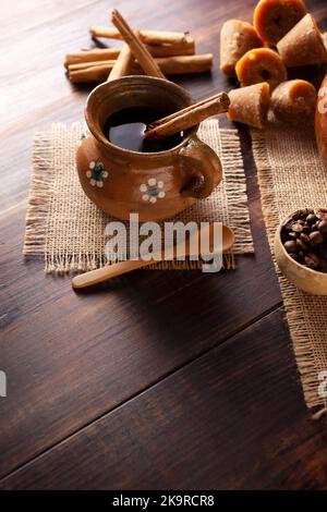 Authentic homemade mexican coffee (cafe de olla) served in traditional