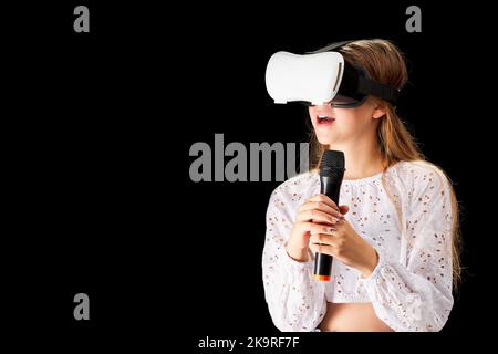 teenager use modern technologies for entertainment or education. VR musician concept Stock Photo