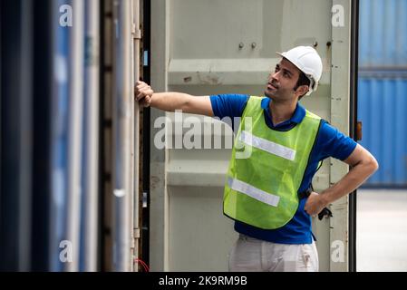 Young logistic worker man wearing worker uniform found out making mistakes at work. Stock Photo