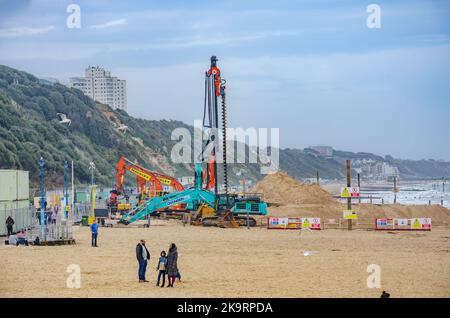 Heavy machinery on the beach at bournemouth in Dorset UK as the beach is closed to allow groins to be replaced. Stock Photo