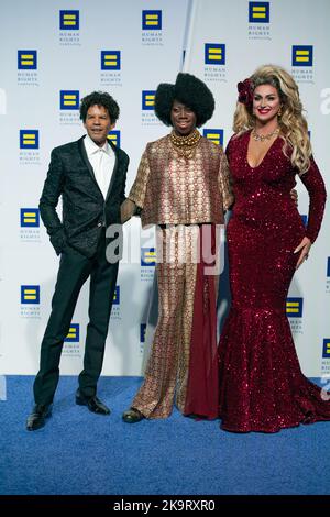 Washington DC, USA. 29th Oct, 2022. Special guests pose for a photo on the Blue Carpet at the Human Rights Campaign National Dinner. The Human Rights Campaign held their annual National Dinner at the Walter E. Washington Convention Center. In addition to a series of speakers which included Vice President Harris and a number of celebrities, attendees watched several musical performances. Credit: SOPA Images Limited/Alamy Live News Stock Photo