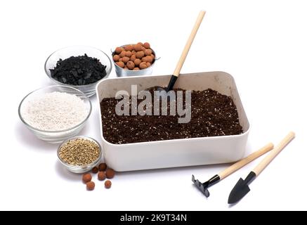Substrate Box plastic box with substrate soil for transplanting houseplants isolated ...