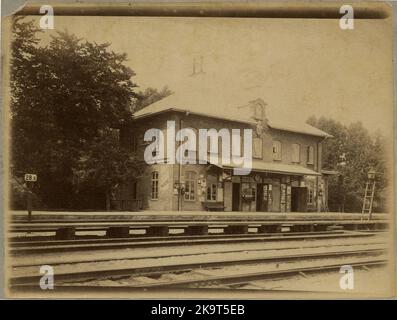 Summer station. State Railways, SJ. The station was built during the 1870s after the Boxholm model, which was designed by chief architect Adolf W. Edelswaard at the State Railway's architectural office. The station was demolished during the 1940s. The banana was electrified in 1939. Stock Photo