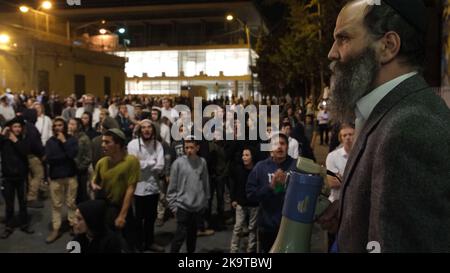 JERUSALEM, ISRAEL - OCTOBER 29: Israeli settlers and right wing activists take part in a demonstration against the arrest of a Jewish settler, in a case which the court imposed a publication ban on the details of the investigation, in front of the police station and detention facility, more commonly known as the Russian Compound on October 29, 2022 in Jerusalem, Israel. The West Bank has seen a rise in attacks by Israeli settlers against Palestinians in recent weeks. Credit: Eddie Gerald/Alamy Live News Stock Photo