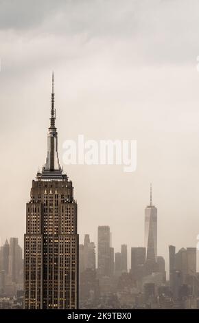 Futuristic view of a skyscraper tower in a light haze of fog or smog Stock Photo