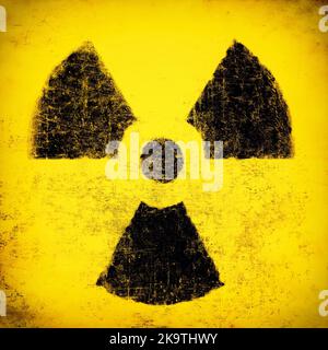 Radiation sign, black on yellow. Nuclear hazard emblem, grunge textured. Radioactive threat symbol Stock Photo