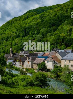 View on the Lez river and the village of Bordes Uchentein in the French Pyrénées (Ariege) Stock Photo