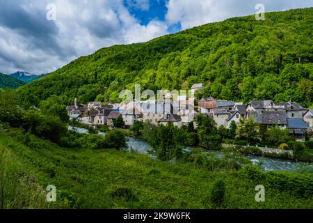 View on the Lez river and the village of Bordes Uchentein in the French Pyrénées (Ariege) Stock Photo