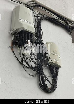 Madrid, Spain; 06-09-2022: cables in a fiber optic center on a wall Stock Photo